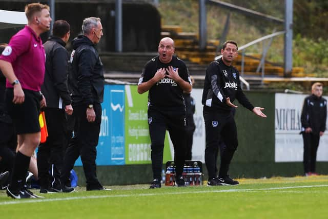 Paul Cook argues with Derek Adams at Home Park