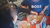 A pub customer has been caught on CCTV placing their own hair into their food in an attempt to get a refund for their meal. (Credit: Tom Croft / SWNS)
