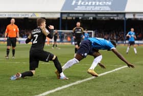 Zak Swanson challenges for the ball.