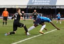 Zak Swanson challenges for the ball.