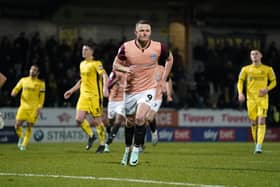 Colby Bishop damaged his left ankle after handing Pompey the lead at Burton on Tuesday night