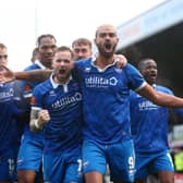 Paul McCallum, right, with Chris Maguire, after scoring Eastleigh's 90th-minute winner against Reading on Sunday