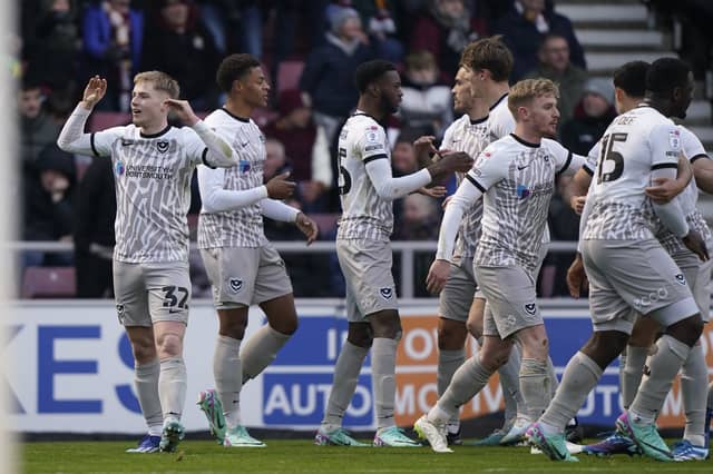 Pompey celebrated another success on the road at Northampton to extend their club record. Pic: Jason Brown