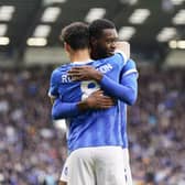 Abu Kamara is congratulated by Alex Robertson following his Pompey opener against Charlton in November