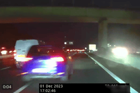 This is the moment a speeding car cuts up an unmarked Hampshire Police vehicle on the M27. (Credit: Hampshire Roads Policing Unit/X)