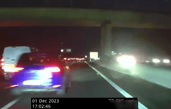 This is the moment a speeding car cuts up an unmarked Hampshire Police vehicle on the M27. (Credit: Hampshire Roads Policing Unit/X)
