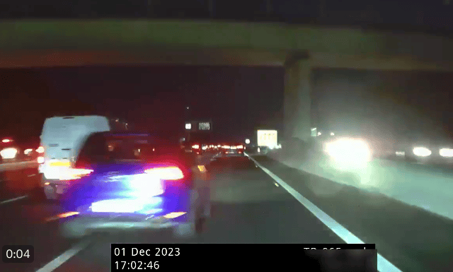 This is the moment a speeding car cuts up an unmarked Hampshire Police vehicle on the M27. (Credit: Hampshire Roads Policing Unit/X)
