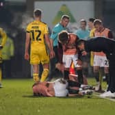 Pompey striker Colby Bishop is out for 'three to four weeks' after being injured at Burton Albion. Pic: Jason Brown