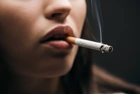 The government could be introducing tighter smoking restrictions in pub gardens and outside restaurants, nightclubs and football stadiums.