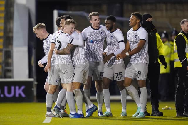 Pompey celebrate Marlon Pack's goal which put them 2-0 up at Shrewsbury. Picture: Jason Brown/PorSportsImages