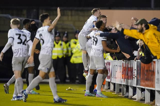 Pompey celebrate Marlon Pack's second-half goal in their 3-0 win at Shrewsbury. Picture: Jason Brown/ProSportsImages