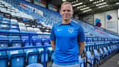 Wigan Athletic signing Anthony Scully is back in Pompey's squad against AFC Wimbledon.