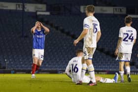 Pompey midfielder Terry Devlin had a night to forget against AFC Wimbledon. Pic: Jason Brown/ProSportsImages