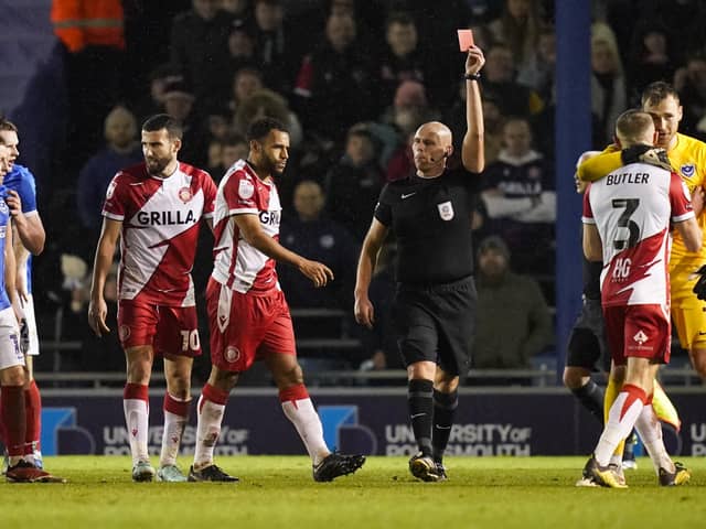 Nathan Thompson heads straight for the Fratton Park changing room after being dismissed by referee Charles Breakspear for his high-foot challenge on Christian Saydee