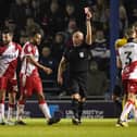 Nathan Thompson heads straight for the Fratton Park changing room after being dismissed by referee Charles Breakspear for his high-foot challenge on Christian Saydee