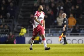 Nathan Thompson heads to the Fratton Park changing rooms after seeing red for his high-footed challenge on Pompey forward Christian Saydee