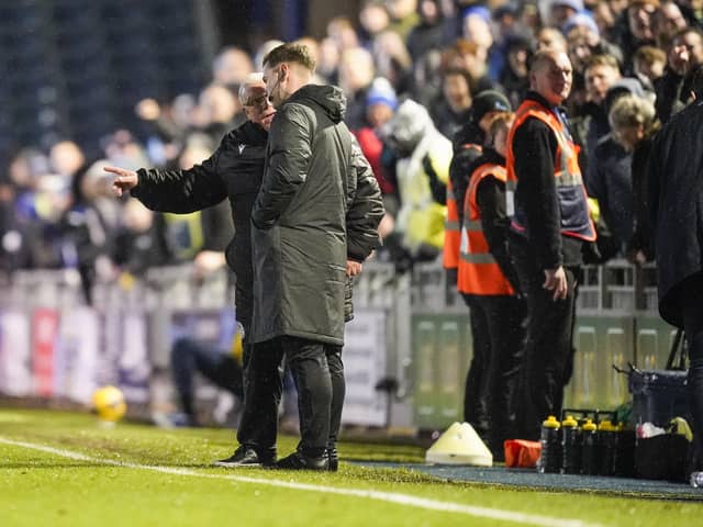 Stevenage boss Steve Evans confronts the fourth official after seeing both Nathan Thompson and Paul Raynor sent off at Fratton Park on New Year's Day