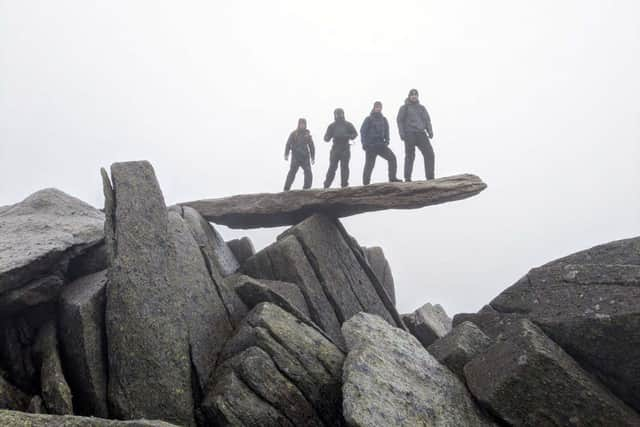 Personnel from 1710 Naval Air Squadron – a specialist unit in Portsmouth Naval Base - are planning to climb the three peaks in the Himalayas in Nepal. They prepared by climbing different parts of Snowdonia in Wales.