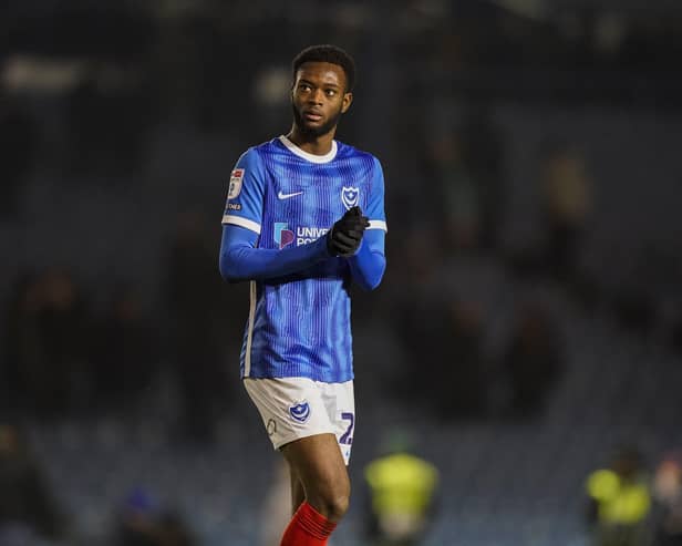 Abu Kamara applauds those who stayed behind after Pompey's 3-0 defeat to Leyton Orient