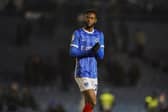 Abu Kamara applauds those who stayed behind after Pompey's 3-0 defeat to Leyton Orient