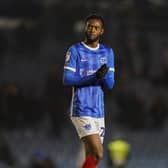 Abu Kamara applauds those who stayed behind after Pompey's 3-0 defeat to Leyton Orient