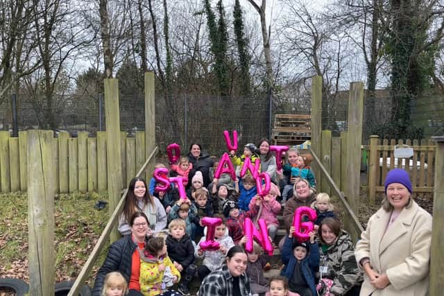 Growing Places at Morelands has received an Ofsted of outstanding following its most recent inspection. 
Pictured: The team at Morelands with the children 