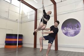The News, Portsmouth reporter Joe Buncle has a go at pole dancing. 