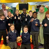Stamshaw Junior School has received a good Ofsted in its recent inspection. 

Pictured: Back left to right -  Rob Jones (Headteacher), Frankey Simmonds, Demi Port, Aoife Staley,  Ayu Temilade, Sid Pushman- Viner (head boy), Kofi Oppong, 
Sam Cantini (Deputy Head) Poppy Bray (Head girl)

Seated:  Lydia White, Franklin Roy, Buddy the school dog.