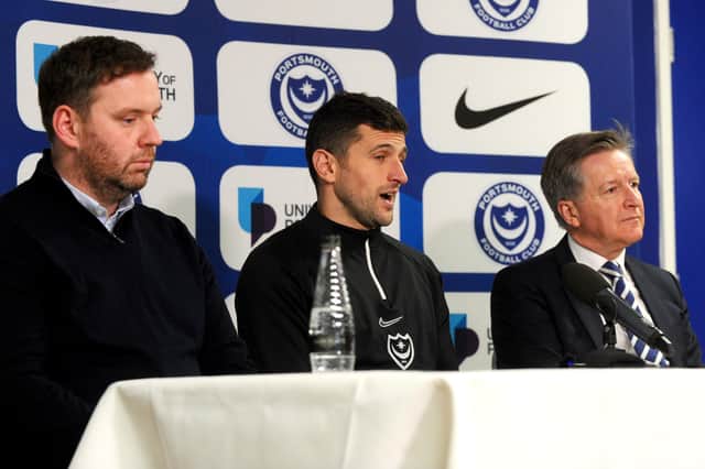 John Mousinho being introduced to the media as Pompey's new head coach in January 2023. Flanked by Rich Hughes and Andy Cullen. Picture: Sarah Standing.