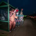 Graeme Lloyd and his friends are walking 15,000 steps a day in January in support of the Motor Neurones Disease Association. They are doing it in 8f inflatable dinosaur costumes. Pictured: Graeme Lloyd (tetradactyl), Tommy Russell (triceratops) and Steven Porter (brontosaurus) 
