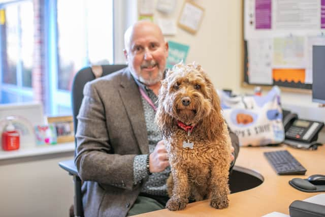 Buddy the Dog with his dad, Rob Jones. 