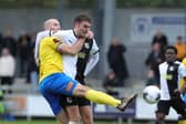 Dartford's Harvey Bradbury battling for possession against the Hawks' Joe McNerney. He has now joined Farnborough. Picture: Dave Haines