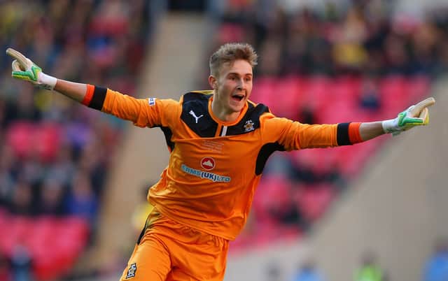 Will Norris celebrates Cambridge United's FA Trophy success at Wembley over Gosport in March 2014. Picture: Getty Images