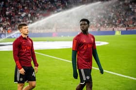 Manchester United rising stars Dan Gore, left, and Omari Forson right have both spent time with Pompey.  (Photo by Ash Donelon/Manchester United via Getty Images)