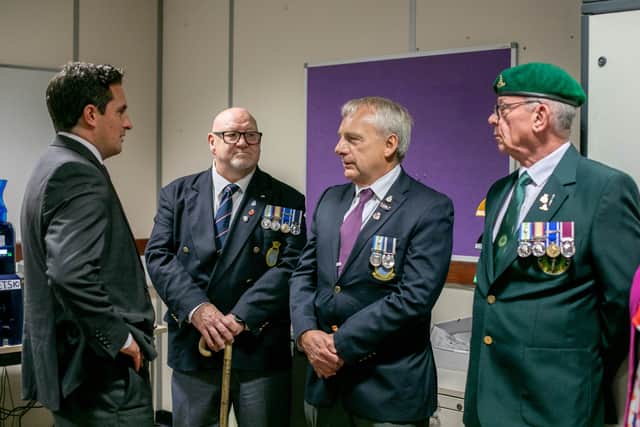 Applications for Veterans ID cards are now open. Pictured is minister for veterans affairs, Johnny Mercer, visiting veterans at HMS Sultan in Gosport on Wednesday 27th September 2023, when the first cards were printed. Picture: Habibur Rahman
