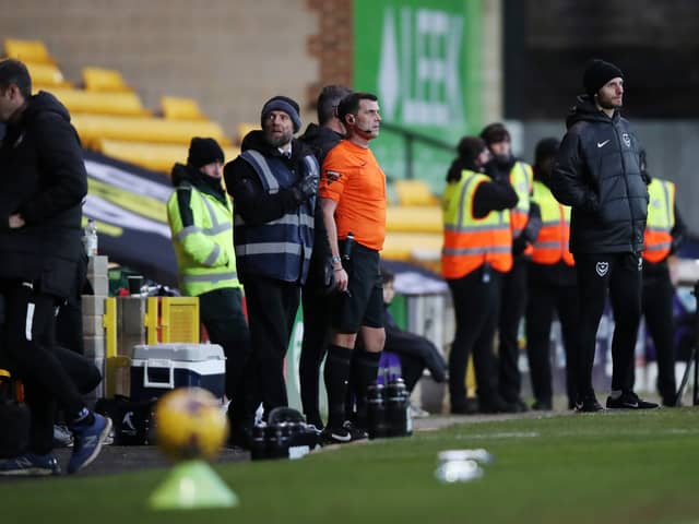 Referee Craig Hicks runs off the pitch after being chased by a Port Vale fan during the Sky Bet League One match at Vale Park, Stoke-on-Trent. Picture date: Saturday January 27. Picture: jess Horny/PA Wire