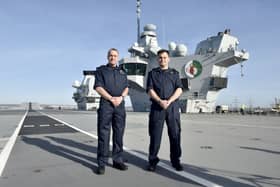HMS Queen Elizabeth was due to leave Portsmouth and be deployed to the North Sea as part of a large Nato Mission - Exercise Steadfast Defender. The aircraft carrier was previously in the North Sea last Autumn. The ship is no longer going to the North Sea due to a mechanical fault. Pictured is: (l-r) Commodore James Blackmore BSc Royal Navy and Captain William King OBE Royal Navy. Picture: Sarah Standing (010224-6142)