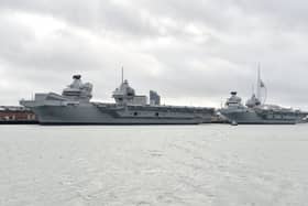 HMS Queen Elizabeth and HMS Prince of Wales alongside each other at HMNB Portsmouth. Picture: Sarah Standing (060224-6529)