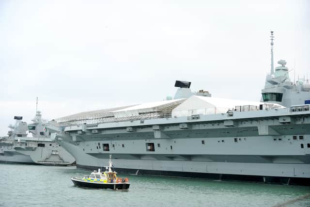 Maintenance work being carried out on HMS Prince of Wales. Picture: Sarah Standing (060224-5221)