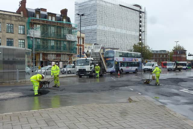 Workers at The Hard Interchange making repairs on October 18 2019. Picture: Terry Pearson