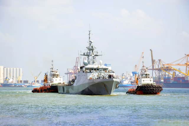 Tugs guide HMS Spey into harbour in Colombo. Picture: Royal Navy/MoD Crown Copyright.