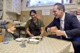 Pictured is: David Johnston speaks to David Tului (4) and Anne Perera, casual practitioner.