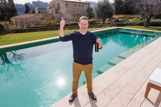 A lucky dad has won the keys to a spectacular Spanish villa worth over £3 million – as well as £250,000 in cash - all thanks to a second-hand armchair. 

