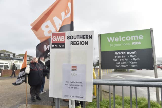 One of the GMB Union protest signs outside the Asda superstore. Picture: Sarah Standing (090224-6879)