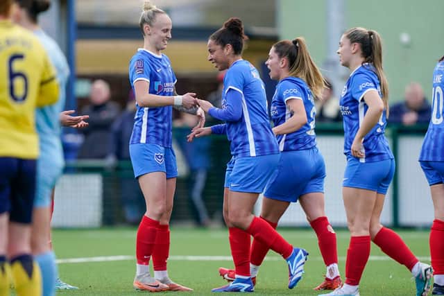 Daisy Mclachlan is congratulated following her goal against Oxford on Sunday