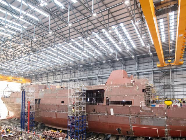 HMS Venturer, one of the Royal Navy's new Type 31 frigates, being raised on jacks at Rosyth in Scotland. Picture: Royal Navy.