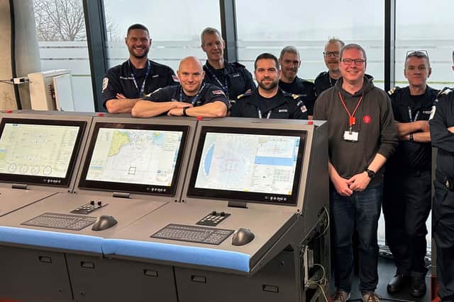 HMS Venturer's crew with the bridge system for the new ship in Portsmouth. Picture: Royal Navy.