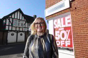 Emsworth clothing shop Karen George is under threat of closure due to cost of living pressures and a poor winter season. Owner Karen Hall has launched a "rescue mission" half price sale in a desperate bid to save the business ahead of its 7th anniversary. Pictured is owner Karen Hall in the shop.