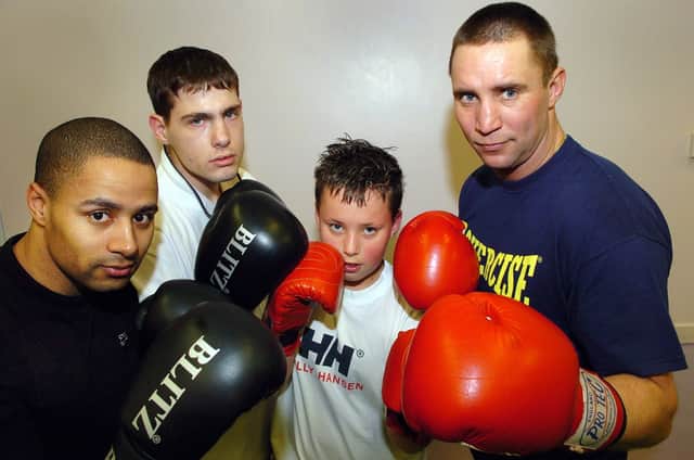 Gosport ABC head coach, Darren Blair, right with son Harvey Blair, second right, and some of his boxers in 2006.