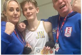 Gosport and boxing are mourning the death of Gosport ABC head coach Darren Blair, at the age of 54. Blair is here, right, with boxer Jack Harrop, centre, and Blair's partner Leandra Hunter, left.